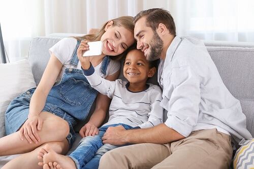 Couple with adopted child